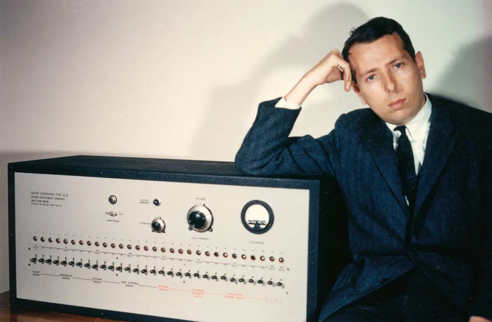 stanley milgram sitting next to his shock device