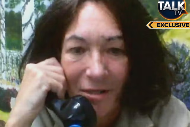 ghislaine maxwell talking in a phone from prison